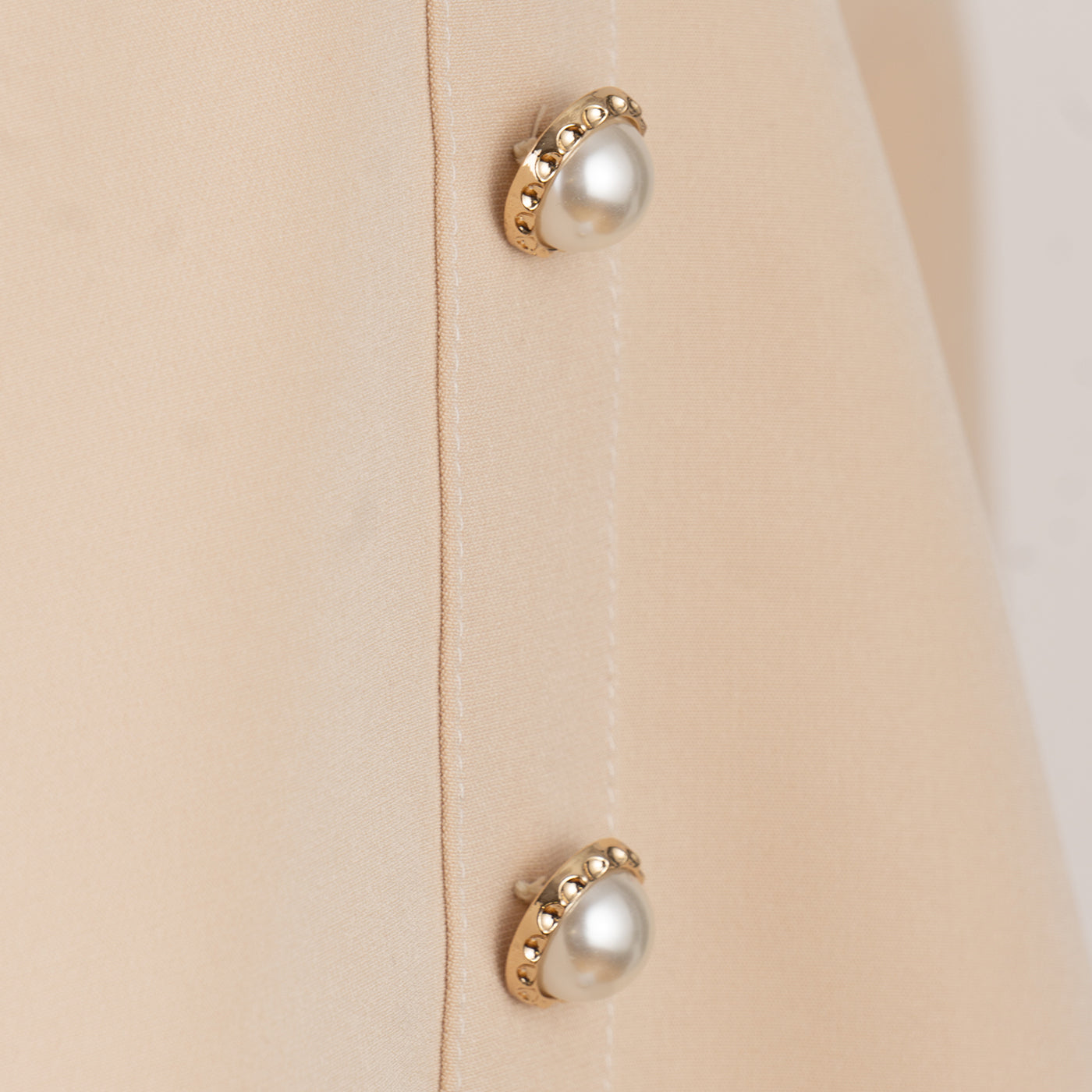 Beige Dress with White Ruffles and Decorative Buttons