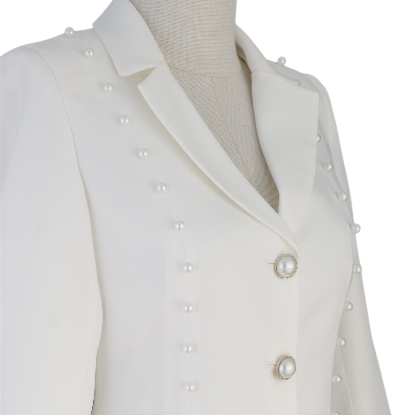 White Suit with Pearl Detail – Sophistication in Every Stitch
