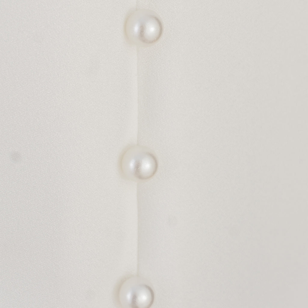 White Suit with Pearl Detail – Sophistication in Every Stitch