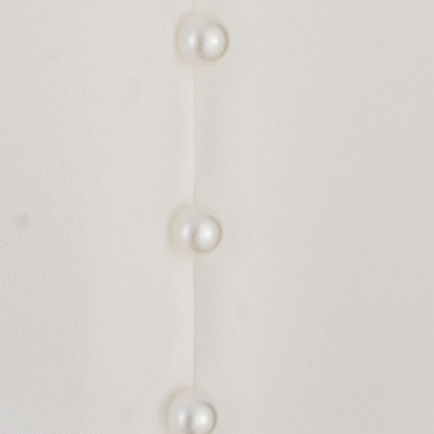 White Suit with Pearl Detail – Sophistication in Every Stitch
