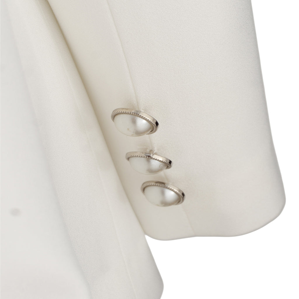White Suit with Pearl Detail – Sophistication in Every Stitch