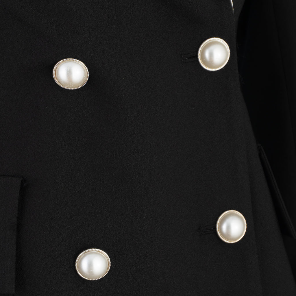 Black Suit with White Collar and Pearl Buttons – Power Meets Elegance