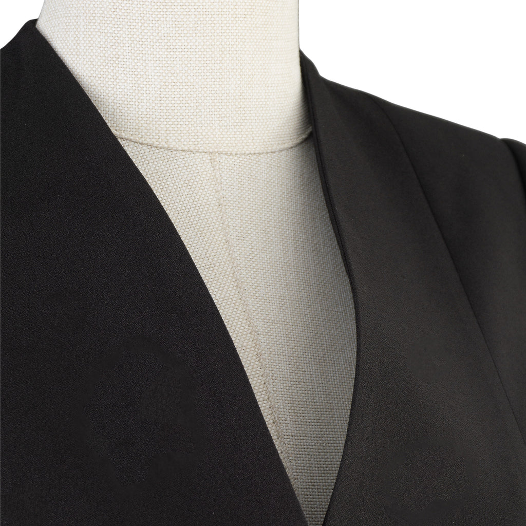 Black Suit with Statement Buttons – Bold Minimalist Elegance