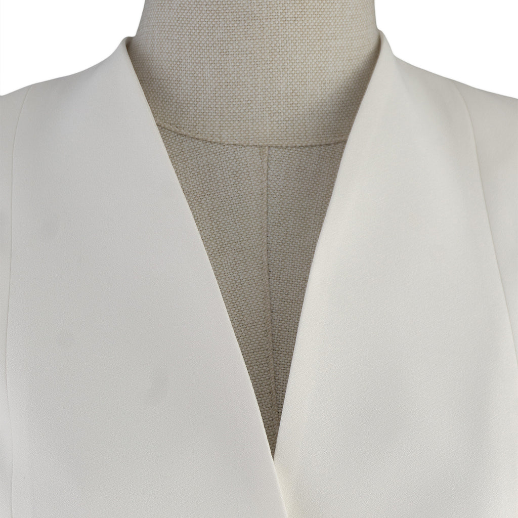 Ivory Suit with Statement Buttons – Understated Elegance